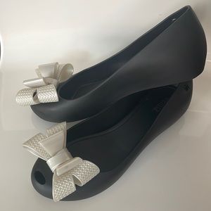 Black Melissa flats with big white bow